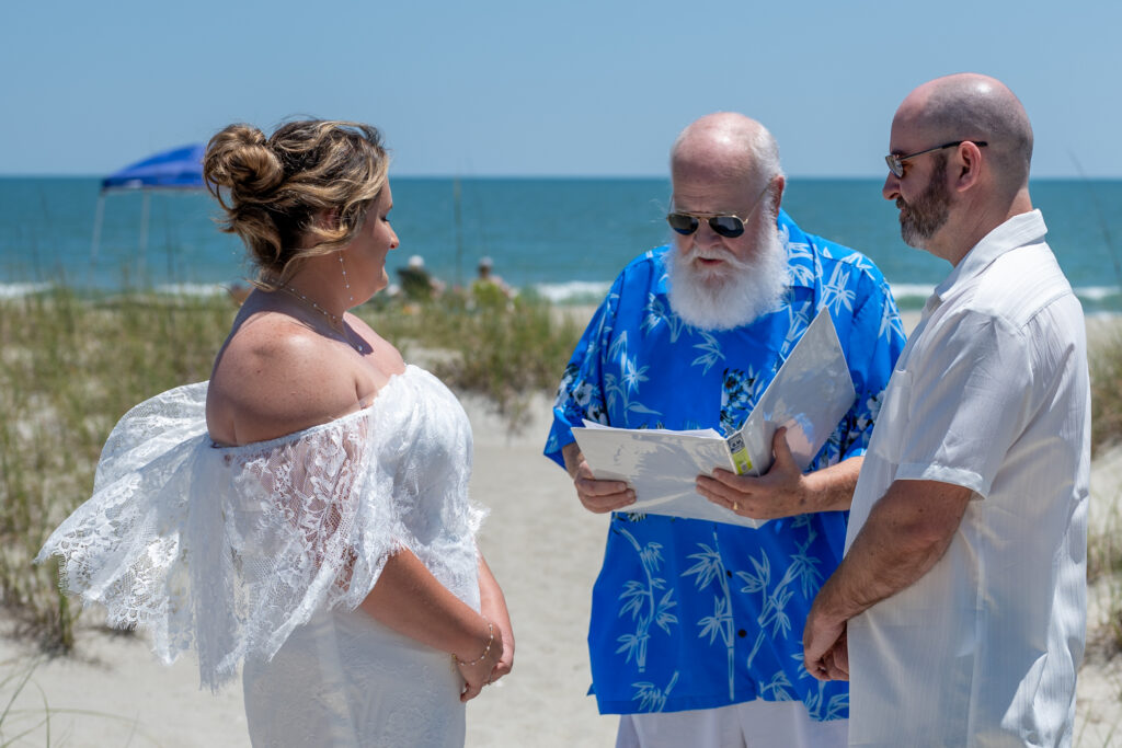 Taylor and Brian Get Hitched at the Beach with our famous all-inclusive Myrtle Beach Wedding Package by Hitched at the Beach! Officiant, Music, Pro Photography, Ceremony Video, Post Couples Photo Shoot and a heart raked into the sand at their ceremony location all for only $549 Taylor and Brian Get Hitched at the Beach with our famous all-inclusive Myrtle Beach Wedding Package by Hitched at the Beach! Officiant, Music, Pro Photography, Ceremony Video, Post Couples Photo Shoot and a heart raked into the sand at their ceremony location all for only $549